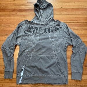 Affliction very distressed hooded sweatshirt wing and cross design on the back